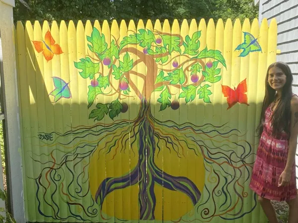 Hand-painted fig tree mural outside Fig Tree Cafe